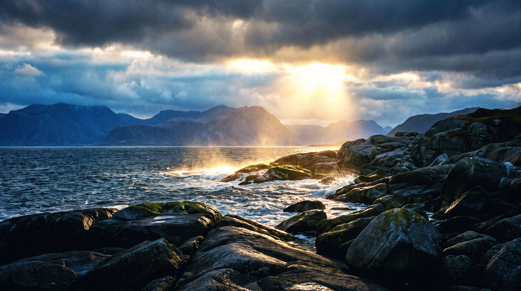 A cold northern coastline under storm cloud